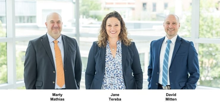 Team pic blue background (1)